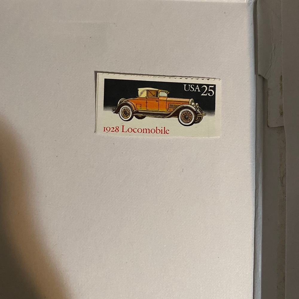 Vintage 1928 locomobile stamp